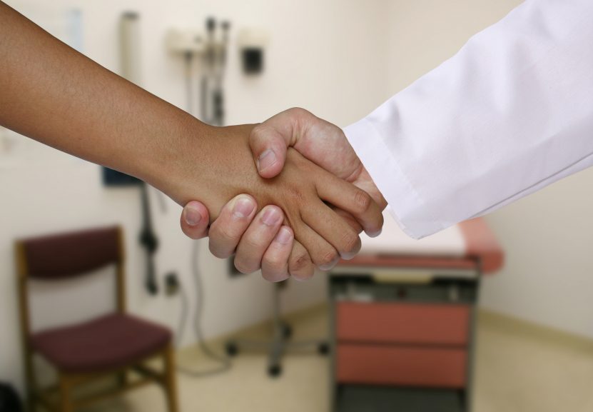 Close up of two people shaking hands